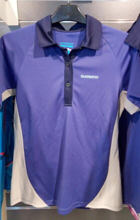 Camisa POLO de mujer de manga corta violeta.